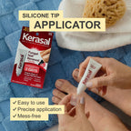Kerasal nail renewal ointment being applied to a discolored toenail