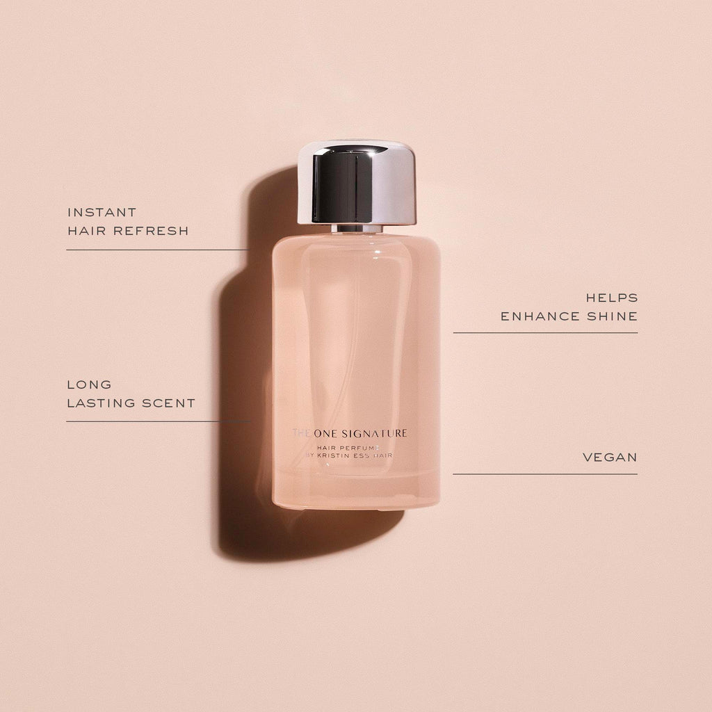 Kristin Ess Signature Hair Perfume lifestyle shot with hair styling tools