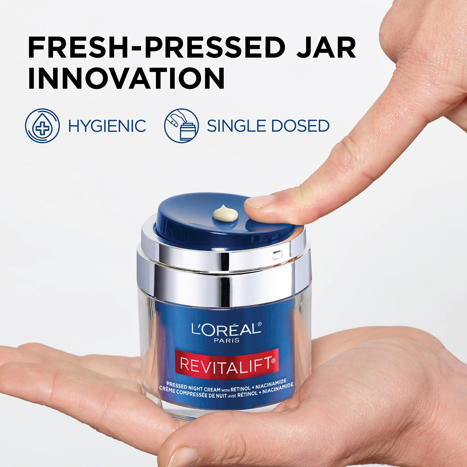 Side view of L'Oreal Paris Revitalift pressed night moisturizer box showing ingredients