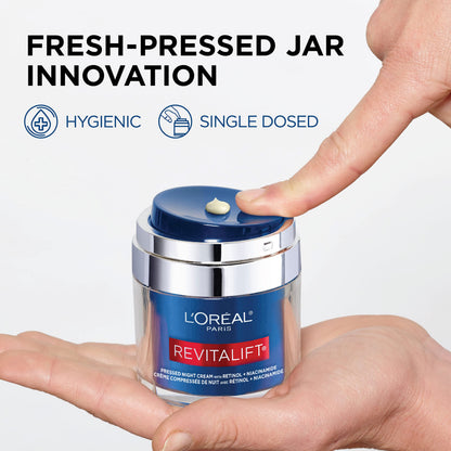 Side view of L'Oreal Paris Revitalift pressed night moisturizer box showing ingredients