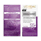L'Oreal Paris anti wrinkle eye cream jar next to product outer box packaging