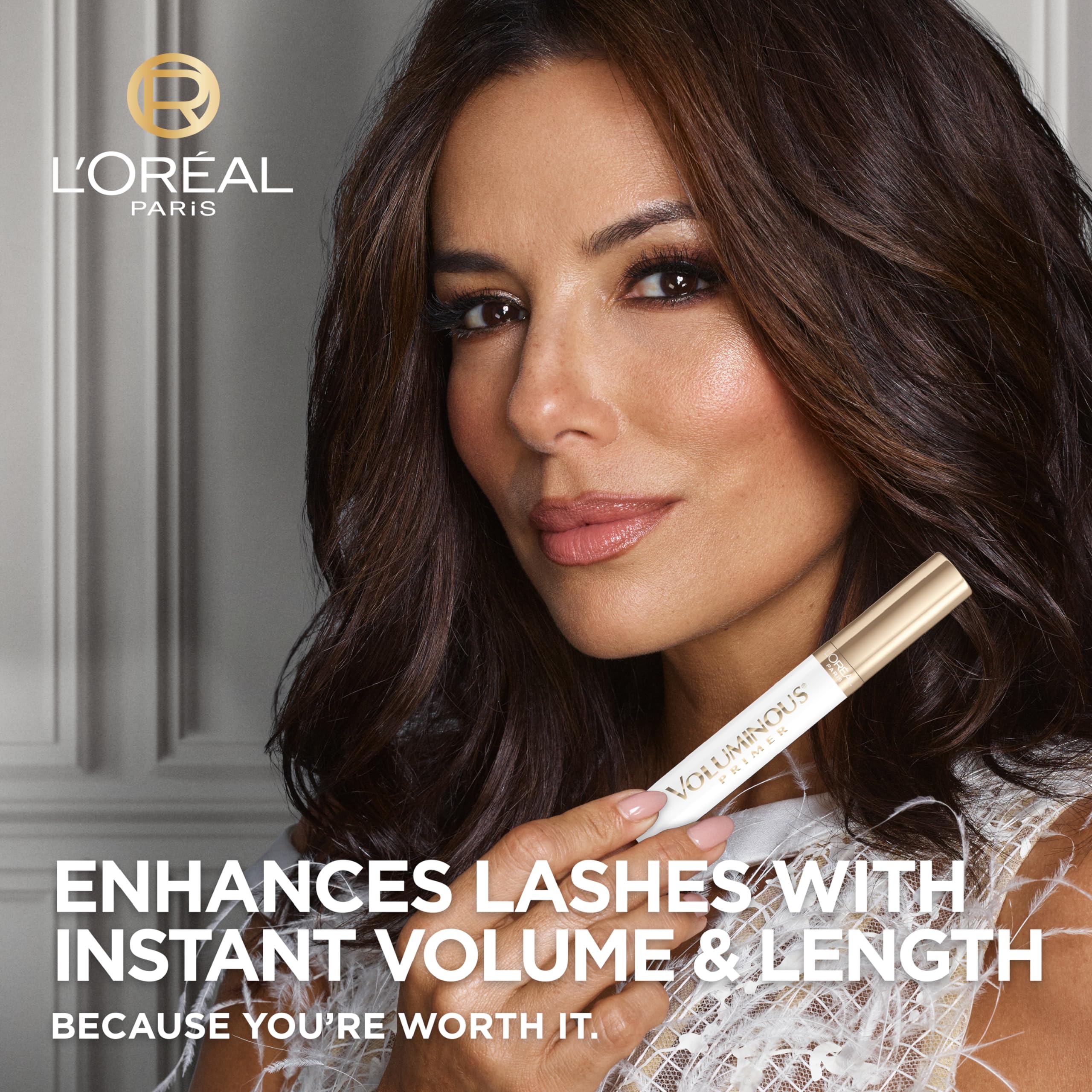 Side view of L'Oreal Paris Voluminous Lash Conditioning Primer white liquid formula container.