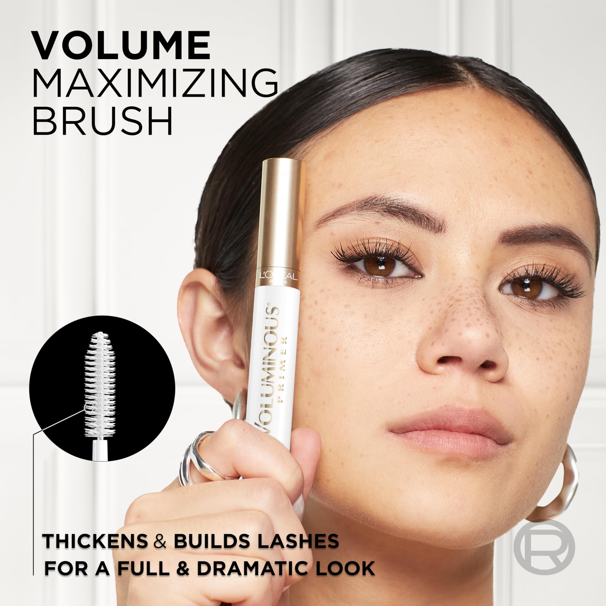 L'Oreal Paris Voluminous Lash Boosting Primer being unboxed demonstrating the standard 0.24 Fluid Ounce bottle size.
