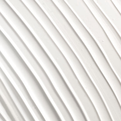 L'Oreal Paris Voluminous Mascara Primer white coat texture demonstration highlighting the volumizing formula thickness.