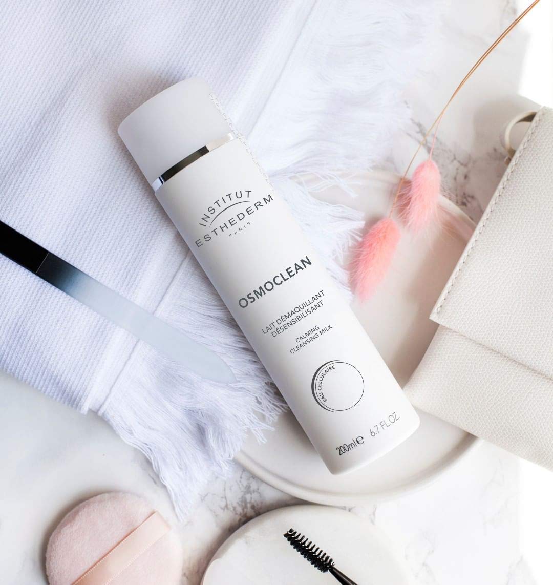 Creamy texture of Institut Esthederm Osmoclean Cleansing Milk on skin