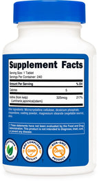 Nutricost Kelp Tablets bottle displayed with natural wellness elements.