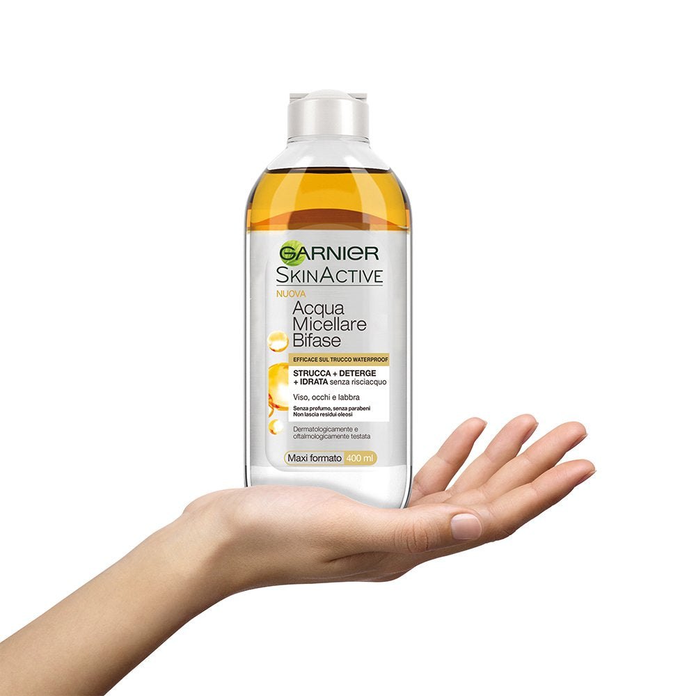 Close up view of the back label details on the Garnier dual phase waterproof makeup remover with argan oil bottle