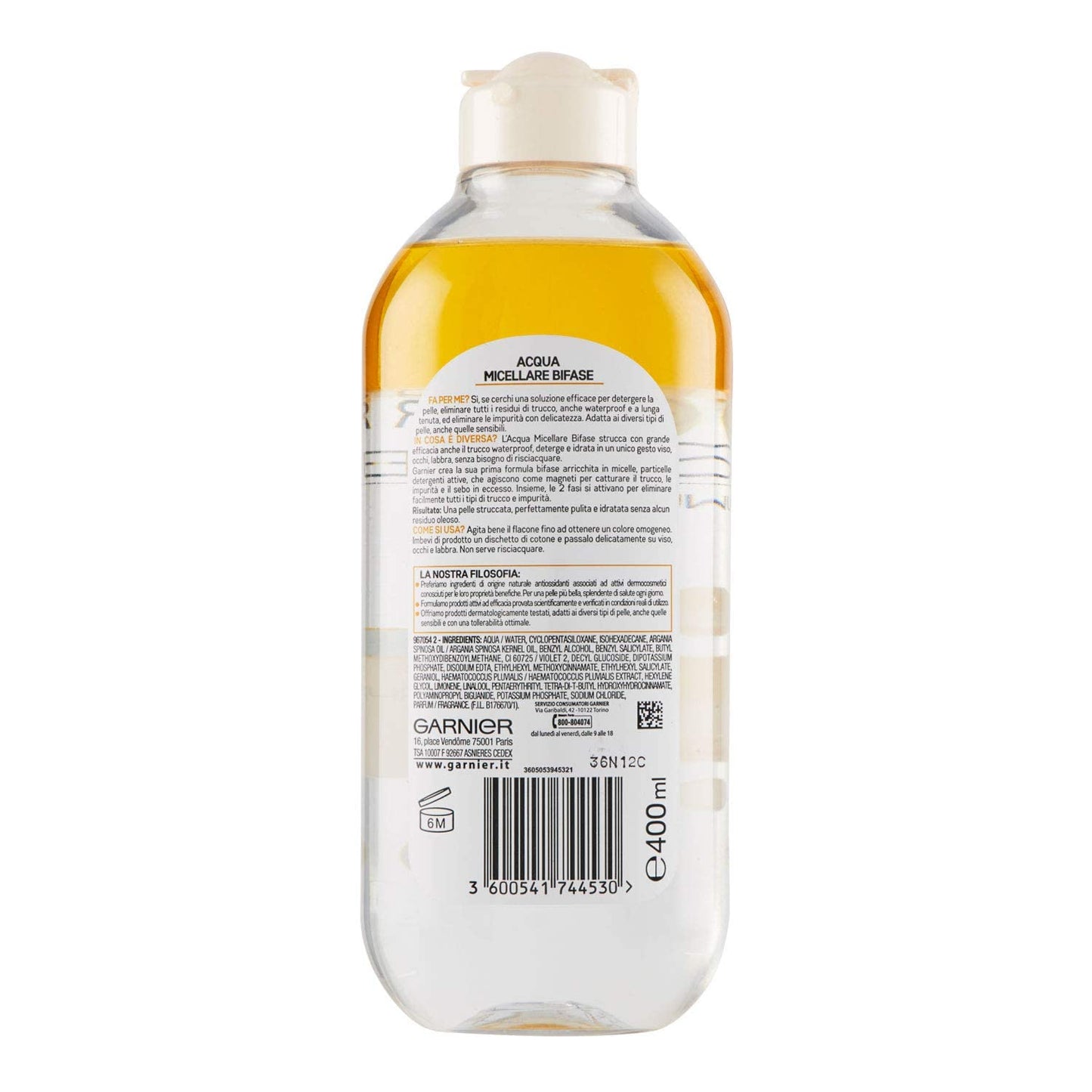 Garnier imported micellar oil infused cleansing water bottle being shaken to blend the two phases for application