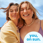Lifestyle image of after sun lotion bottle outdoors
