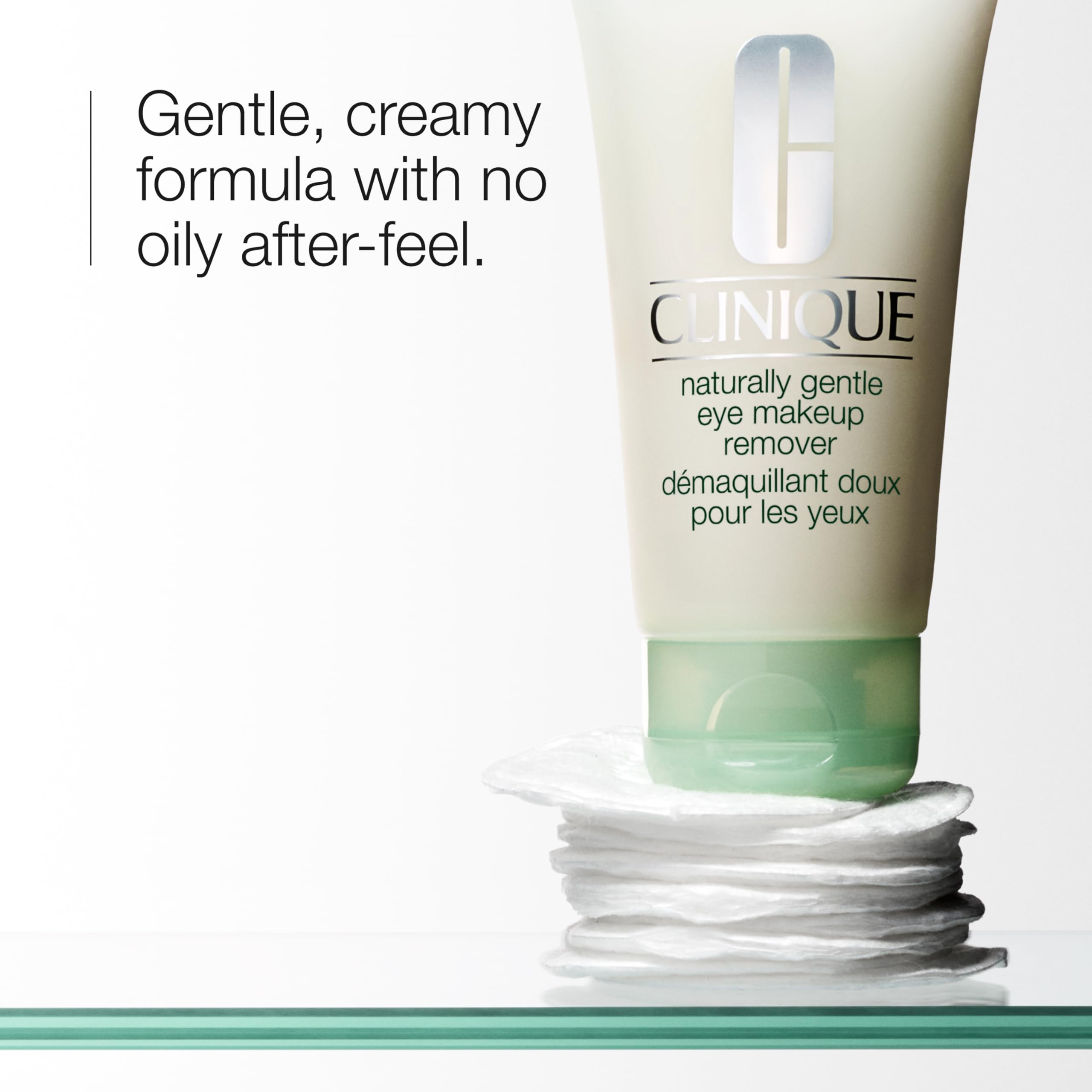 Clinique creamy eye makeup remover lotion texture on fingertip
