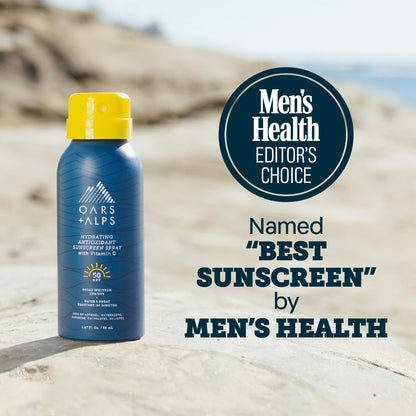 Oars + Alps sunscreen spray application on skin