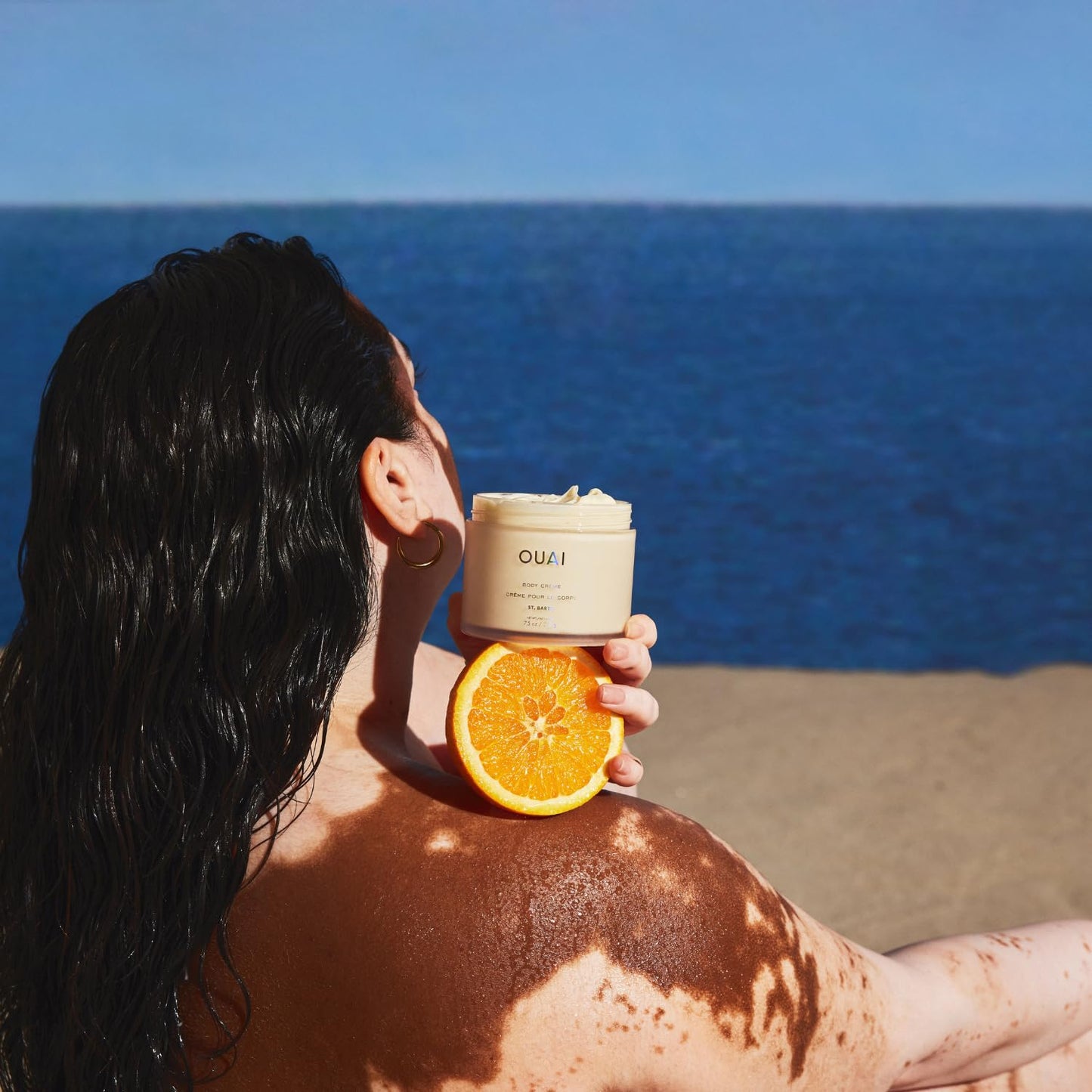OUAI body moisturizer back label showing directions and ingredients list