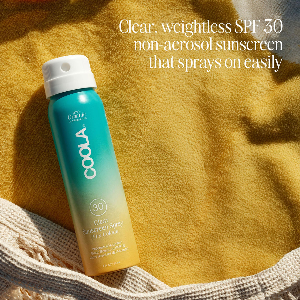 Coola sunscreen spray label showing spf 30 and pina colada scent
