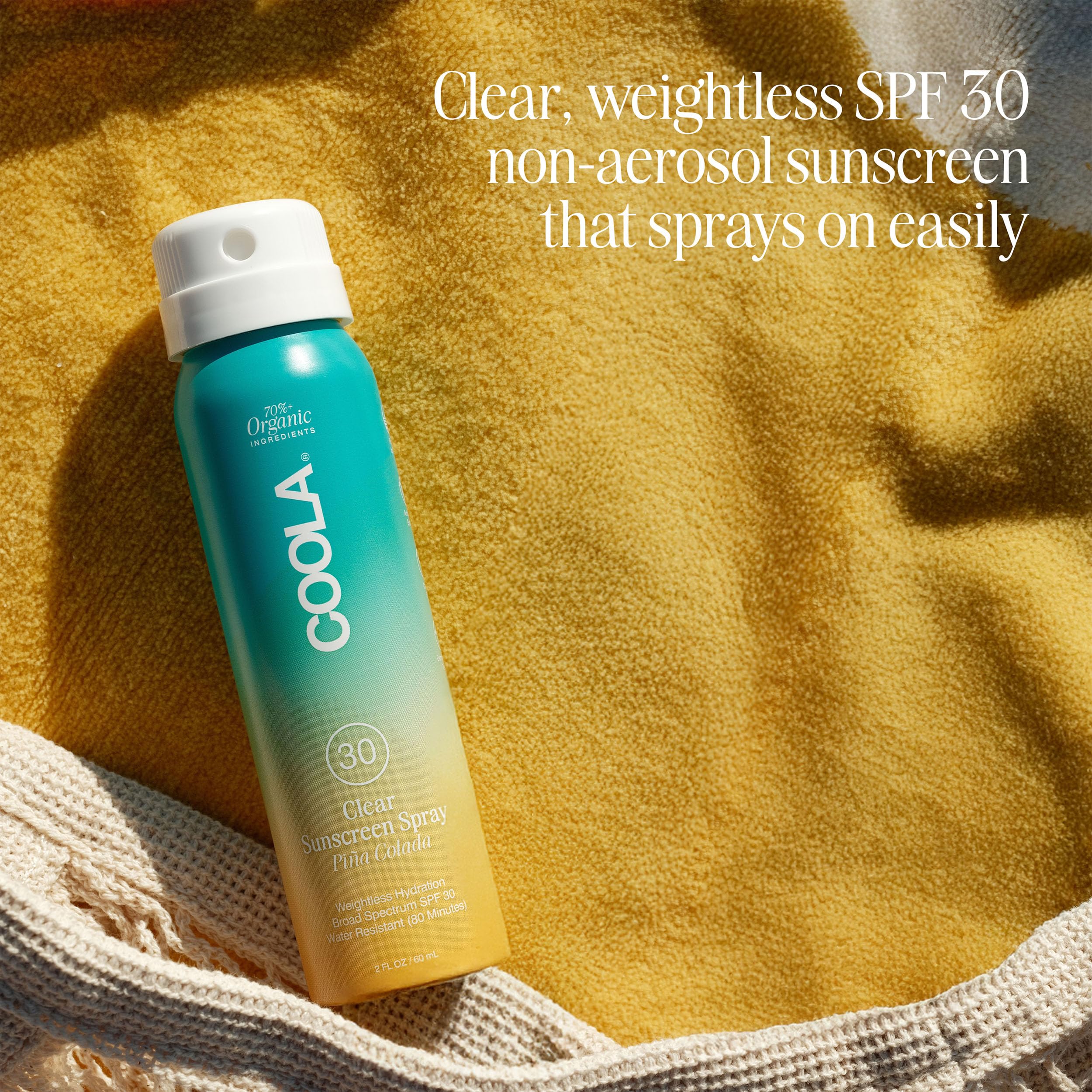 Coola organic sunscreen spray application mist