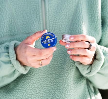 Dermatone sunscreen balm side profile showing compact travel size