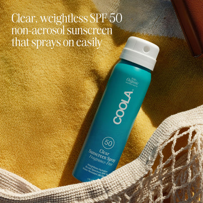 Coola sunscreen spray bottle showing organic ingredients list