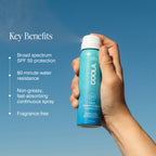 COOLA continuous mist sunscreen spray nozzle and cap close up