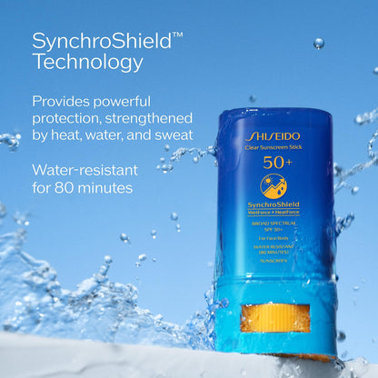 Applying Shiseido sunscreen stick on face
