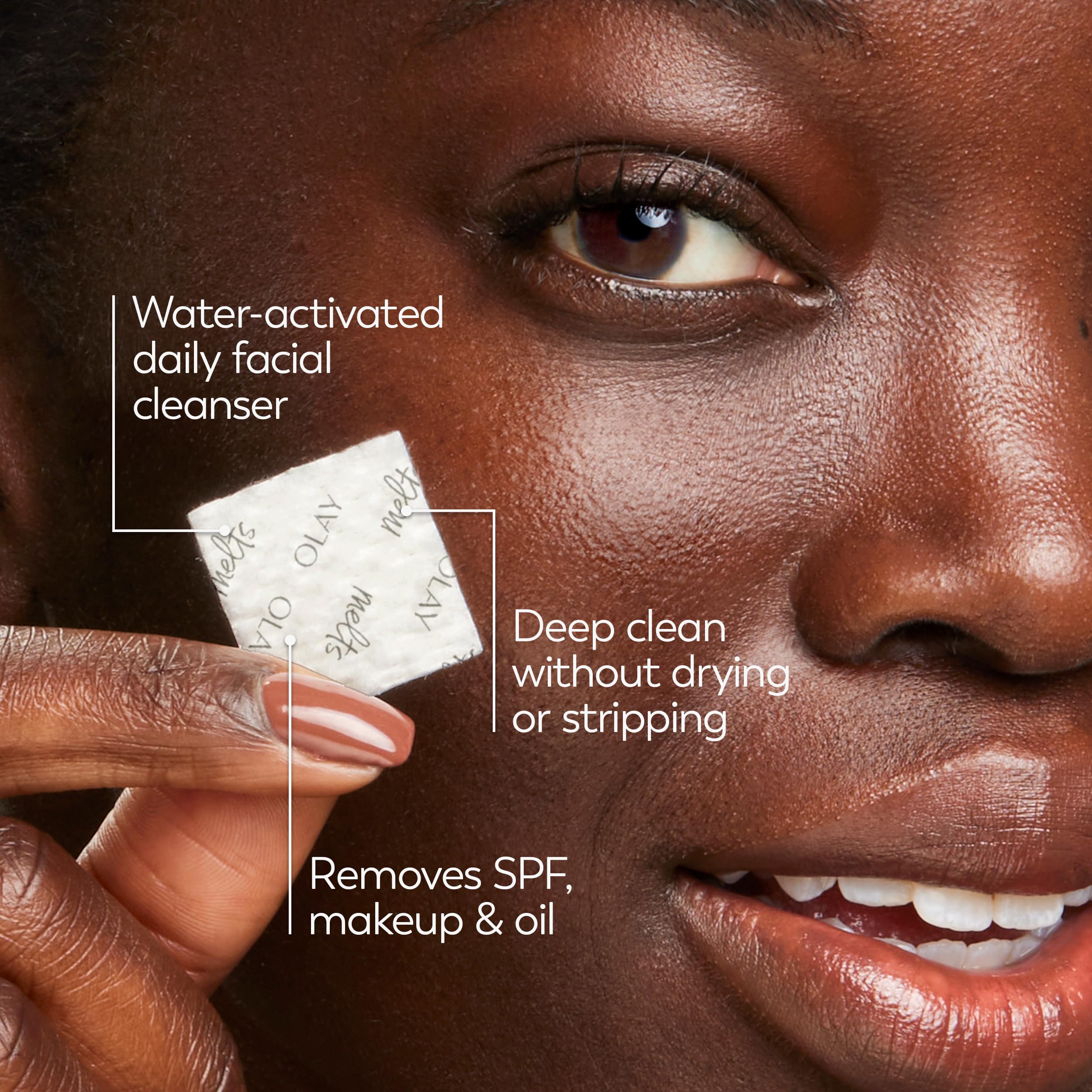 Olay travel size solid facial cleansing pads displayed next to cosmetic travel bag