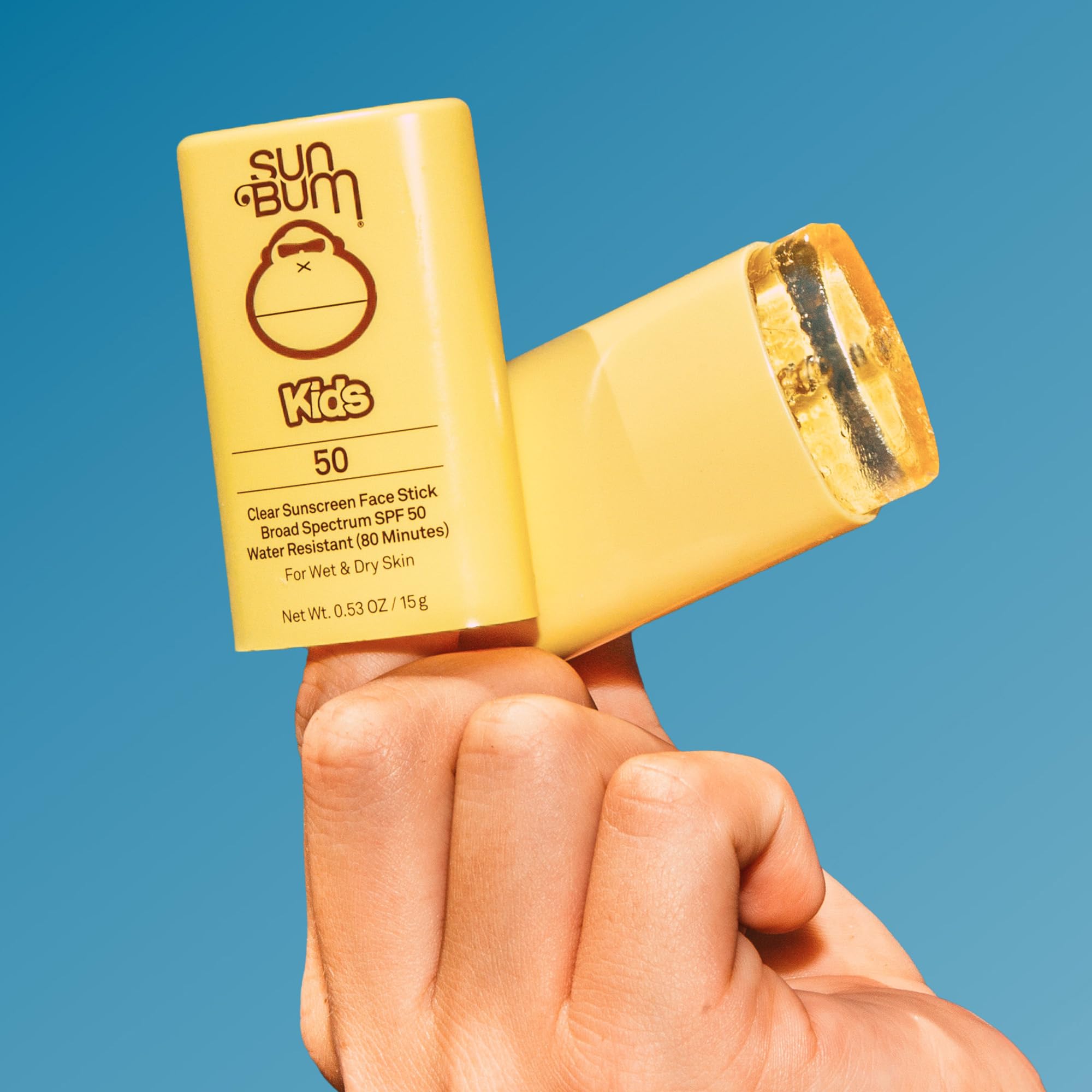 Sun Bum face stick application on child skin