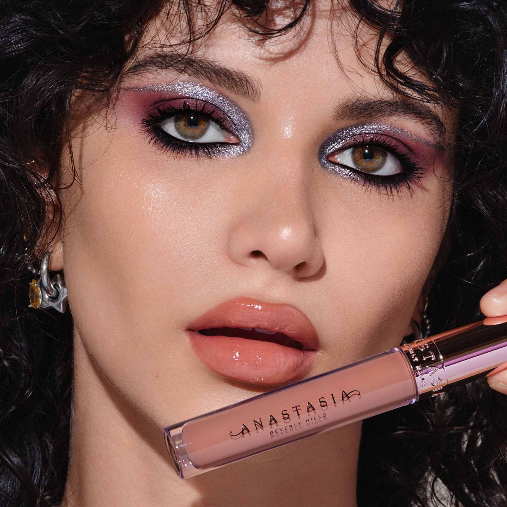 Close up of premium lip gloss packaging and branding logo