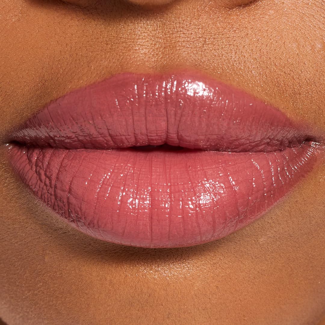 Close up swatch of Revolution Beauty London Pout Lip Gloss Stick in Sweet Rose shade
