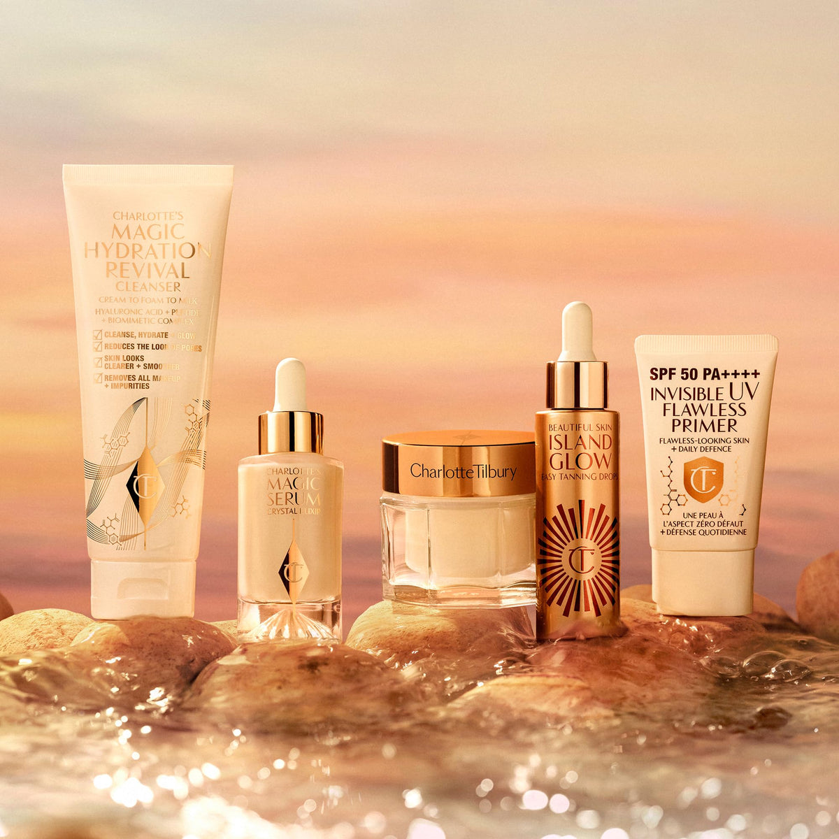 Overhead arrangement of Charlotte Tilbury beauty product and dropper