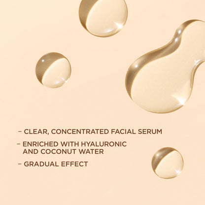Close up of L'Oreal Paris self tanning drops bottle with hyaluronic acid