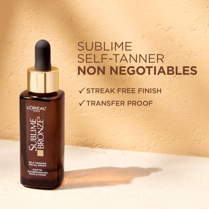 L'Oreal Paris fragrance-free self tanning serum bottle held in hand