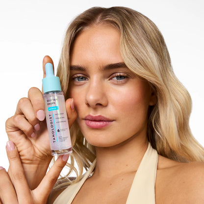 Tanologist illuminating self tan drops close up label