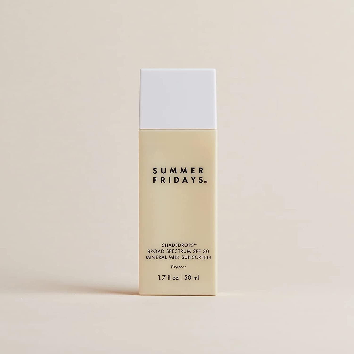 Summer Fridays ShadeDrops sunscreen bottle with packaging