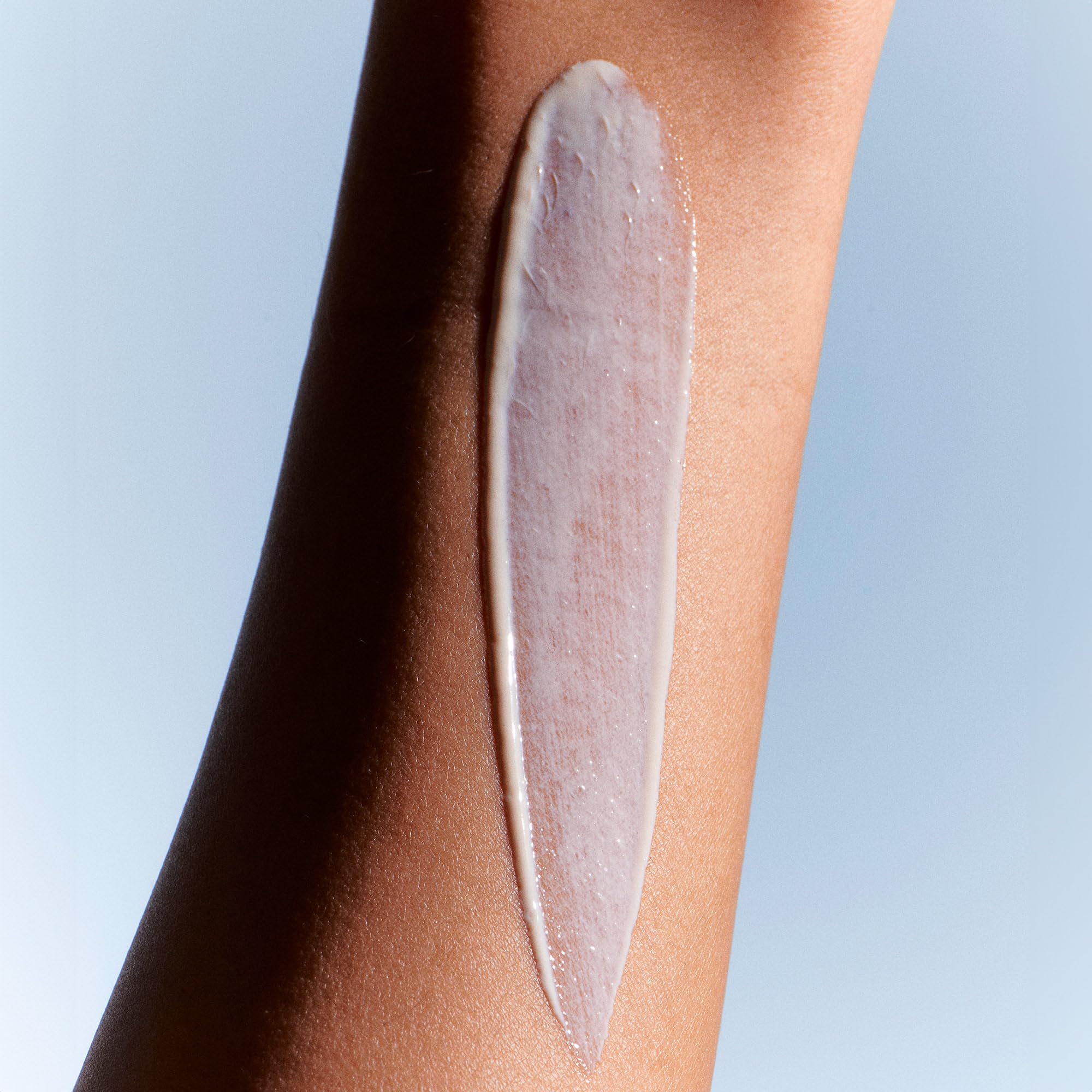 Summer Fridays ShadeDrops SPF 30 application on skin