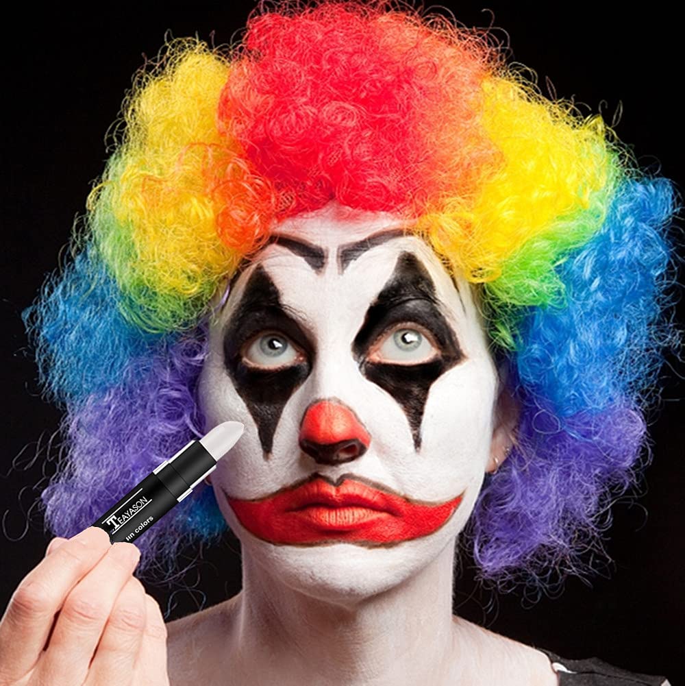 Go Ho special effects face paint sticks showing the twist up mechanism and creamy product texture