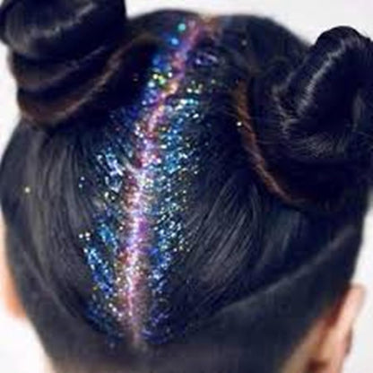 Go Ho loose sparkle powder spray being applied smoothly onto clothing fabric
