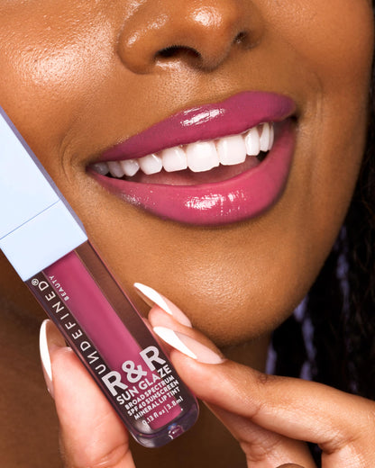 Side profile of Undefined R&R Sun Glaze Pink lip oil tube