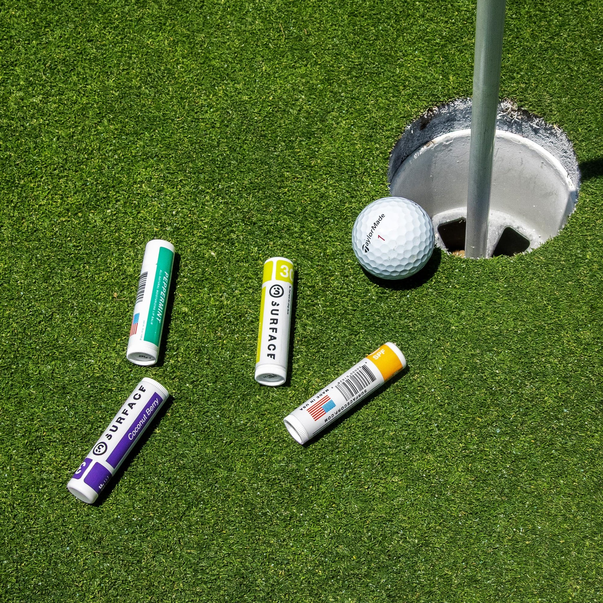Surface Sun Systems Pina Colada SPF 30 lip balm lifestyle shot