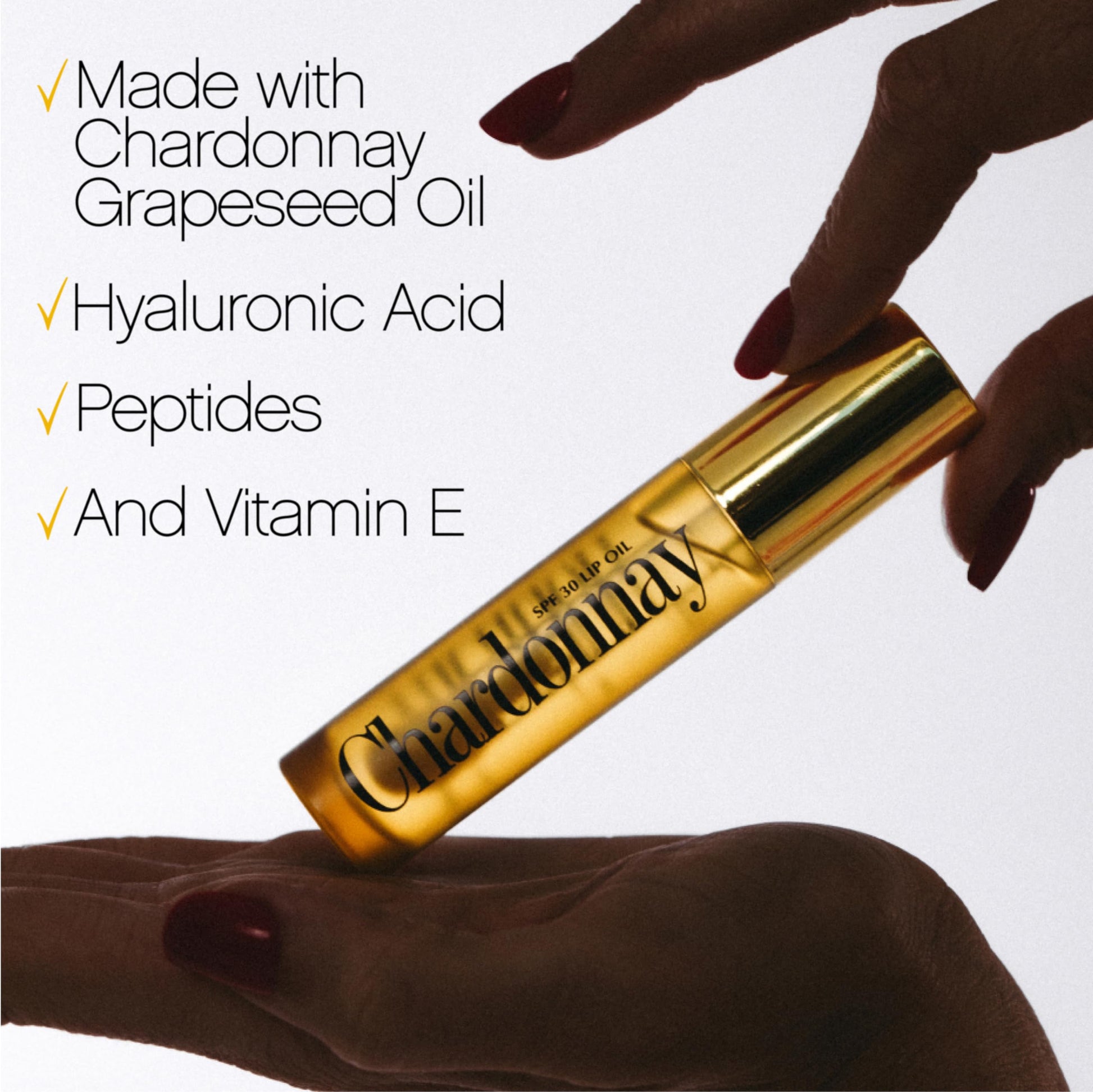 Swatch of Vacation Chardonnay Lip Oil on skin