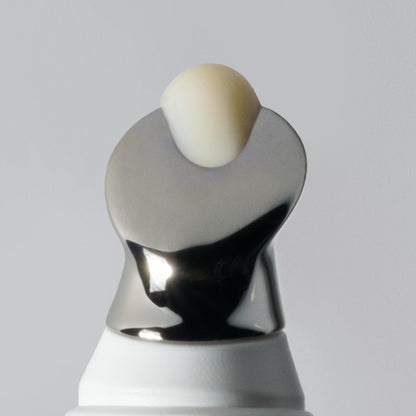 Compact size of OneSkin 7 milliliter lip SPF tube