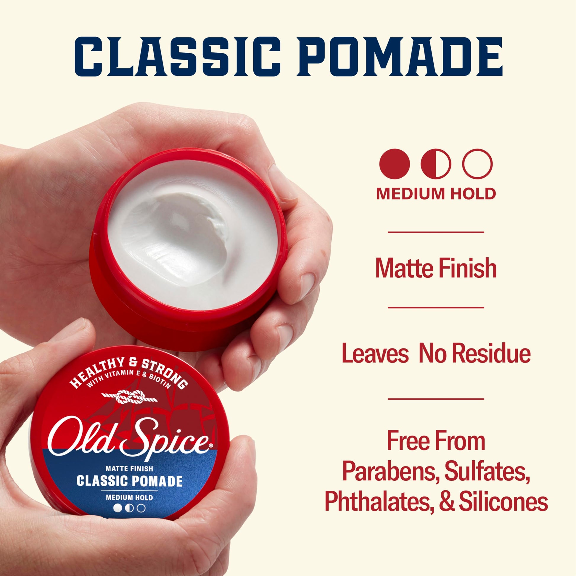Man styling hair using Old Spice Classic Pomade