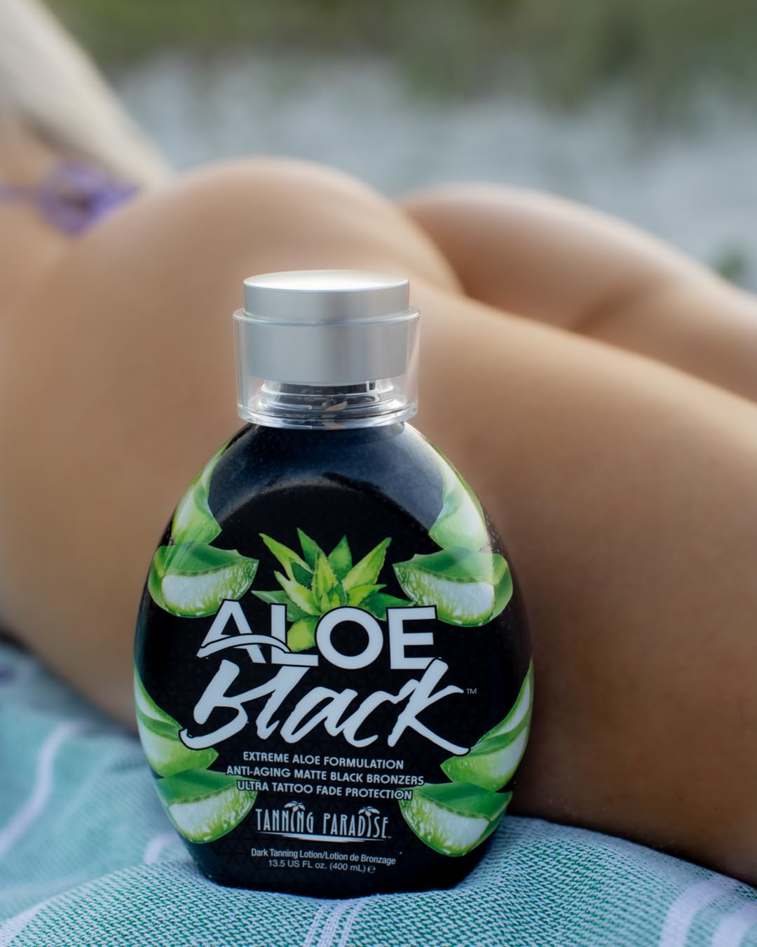 Tanning Paradise Aloe Black lotion texture application