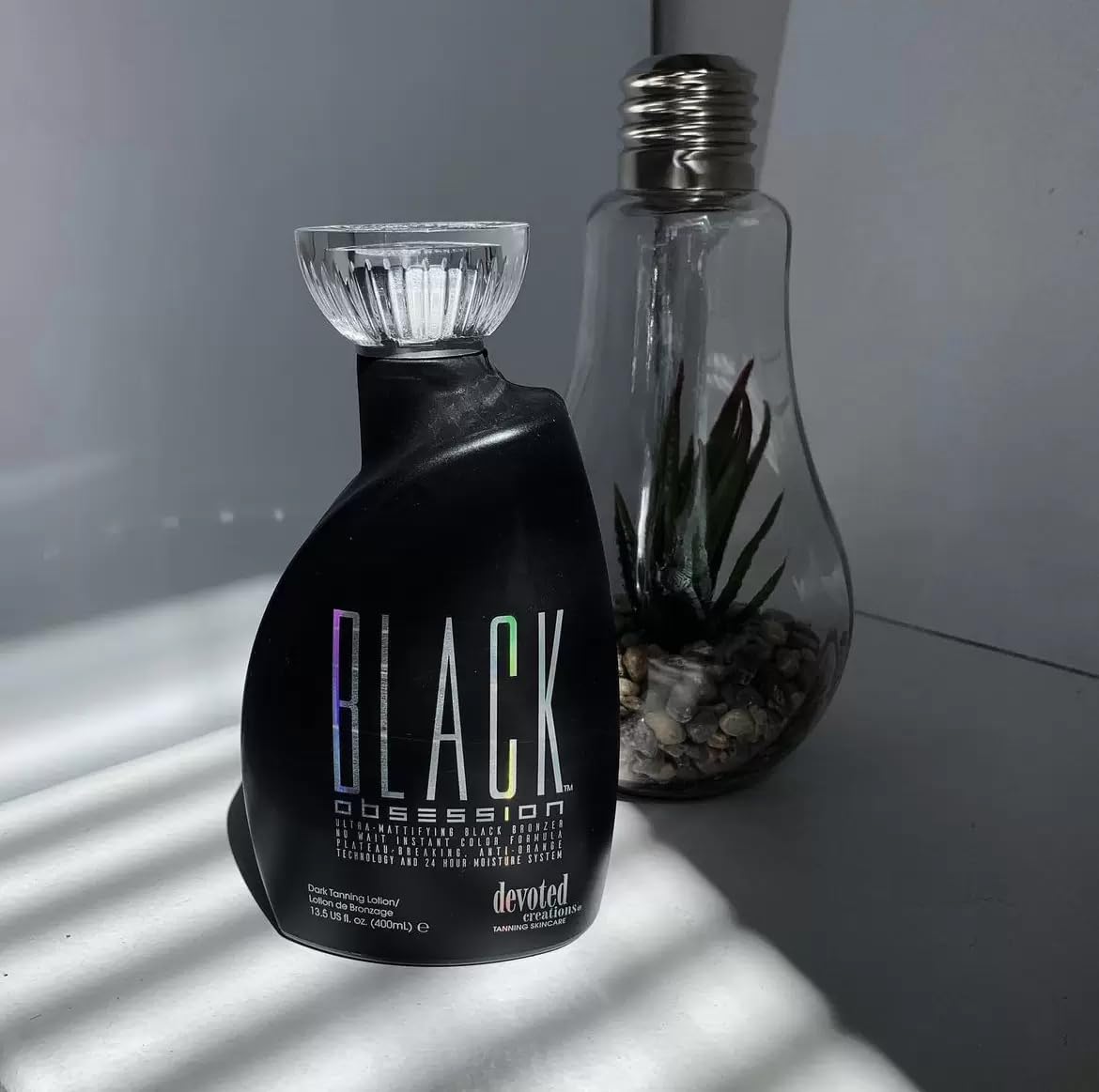 Black Obsession bronzer bottle branding detail