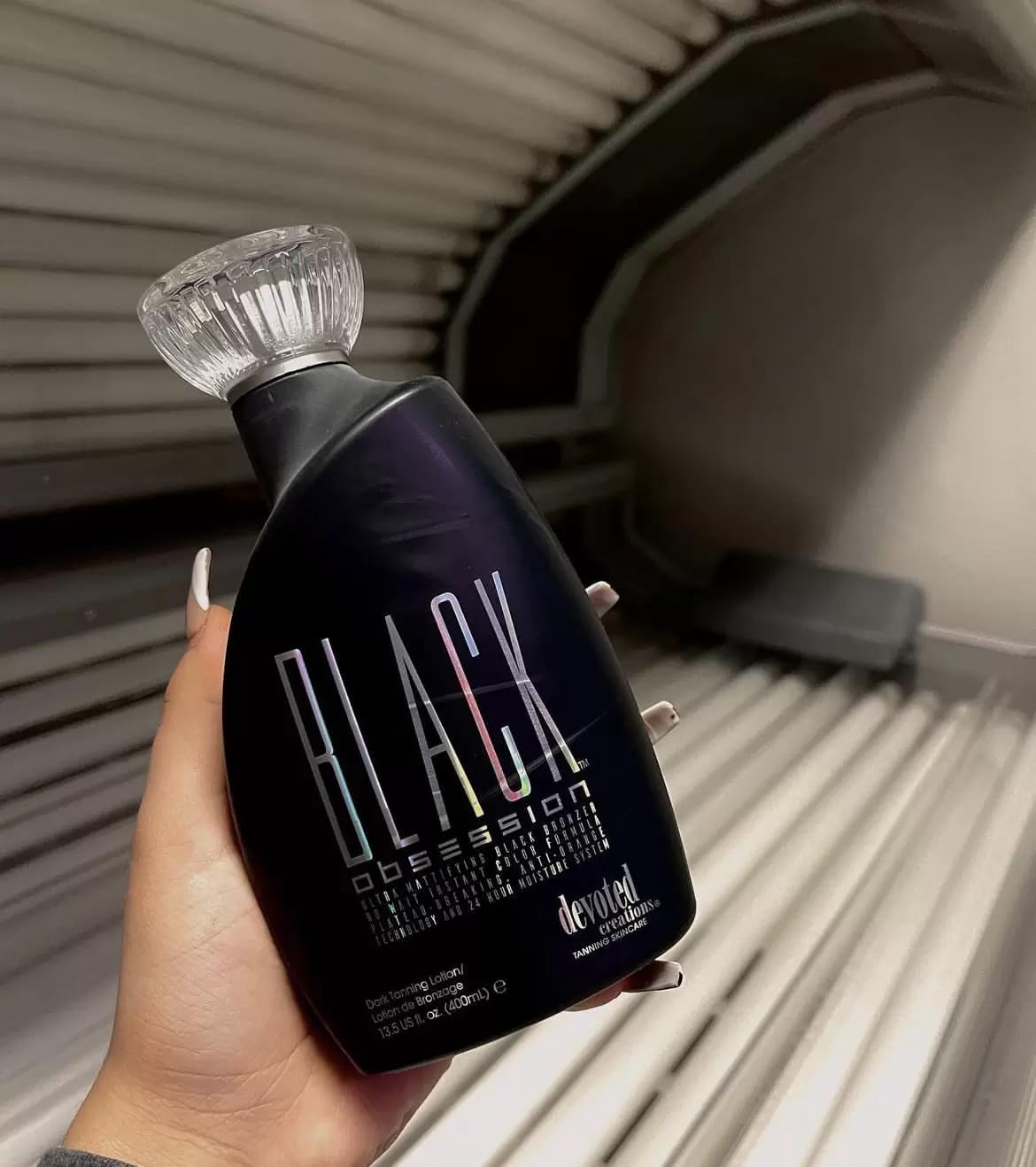 Close up of Black Obsession ultra-mattifying bronzer bottle