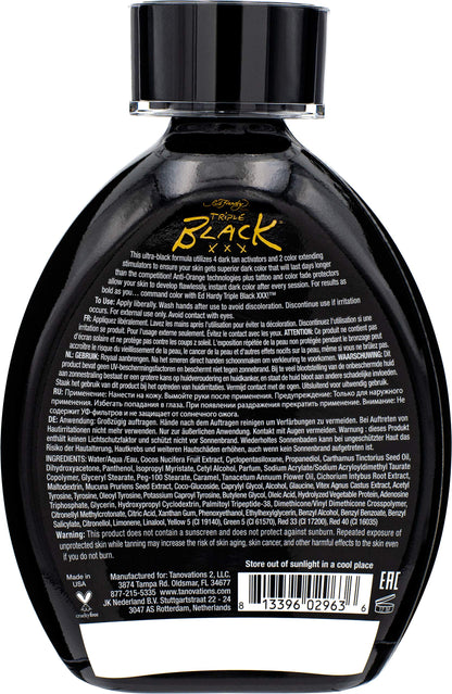Ed Hardy tanning lotion bottle showing dark color bronzing benefits