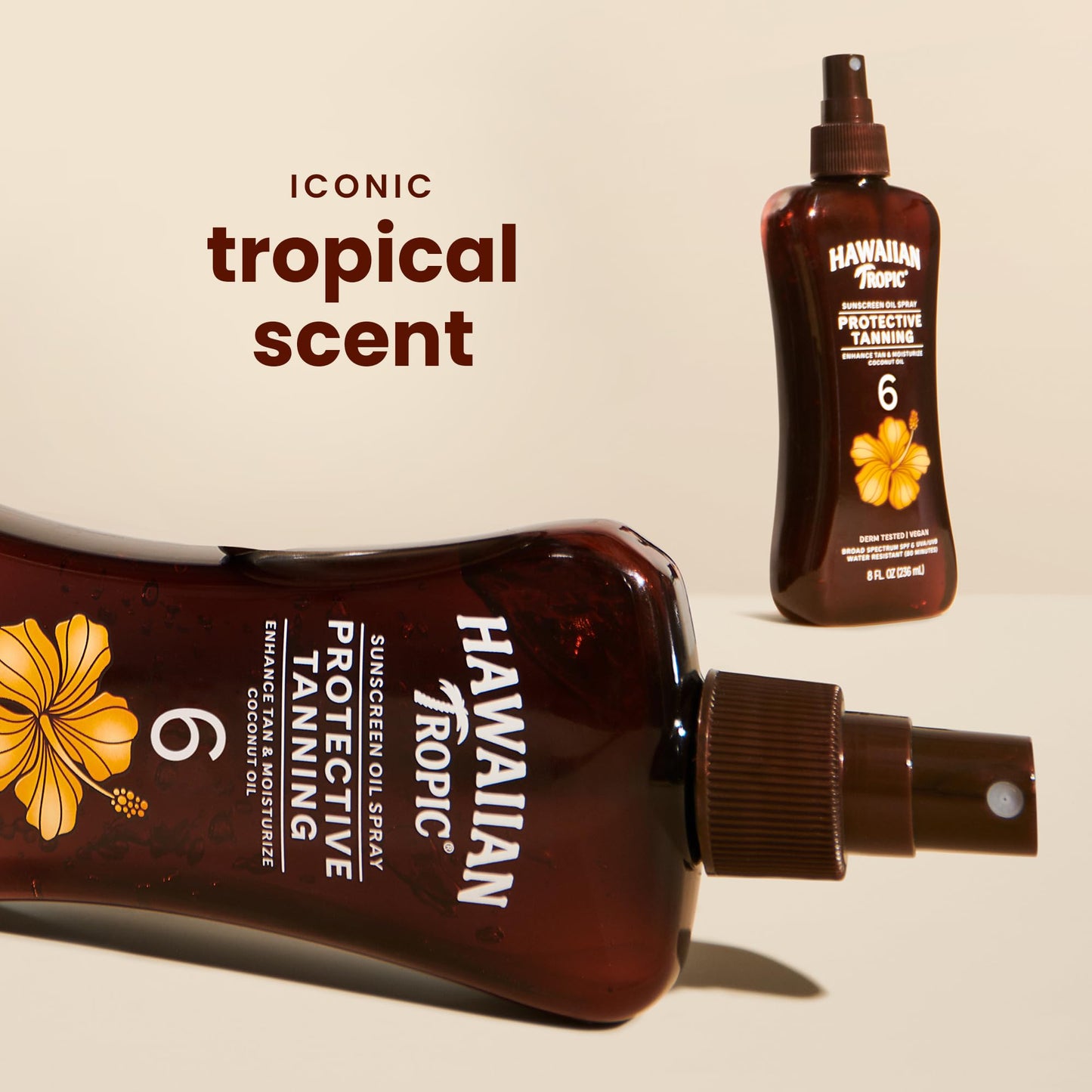Hawaiian Tropic SPF 6 tanning oil bottle on white background