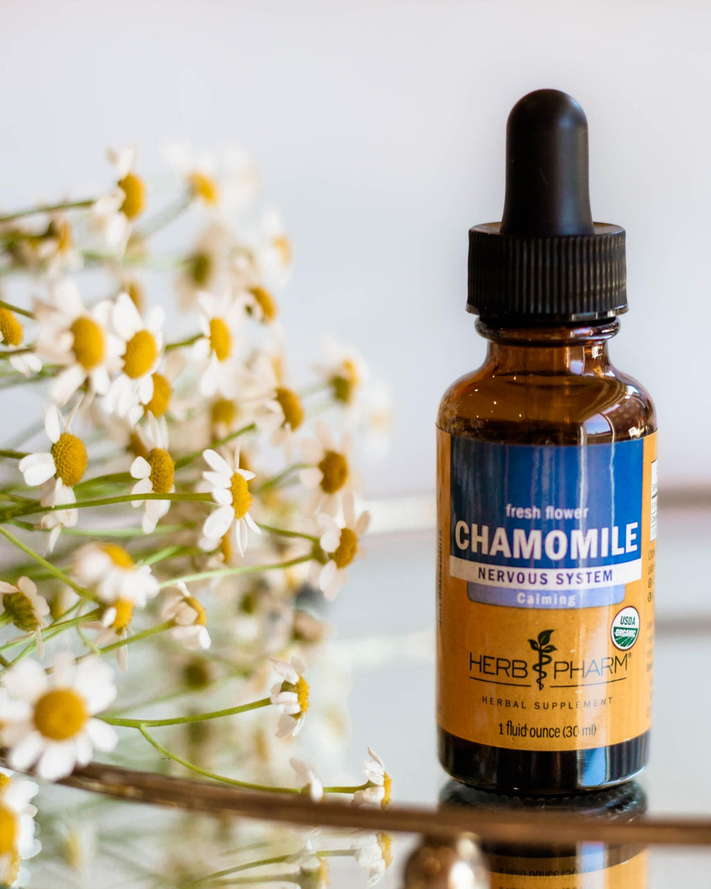 Back label of Herb Pharm chamomile extract detailing USDA organic certification and supplement facts.