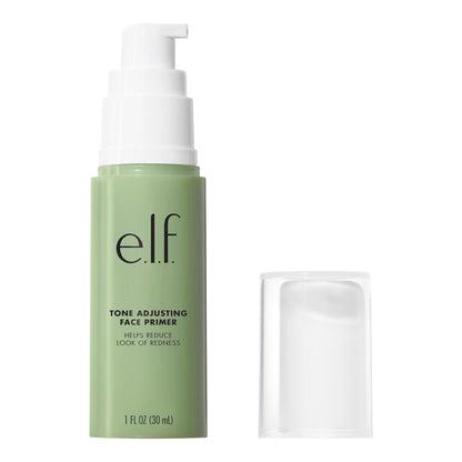E.l.f. green primer bottle next to makeup brush
