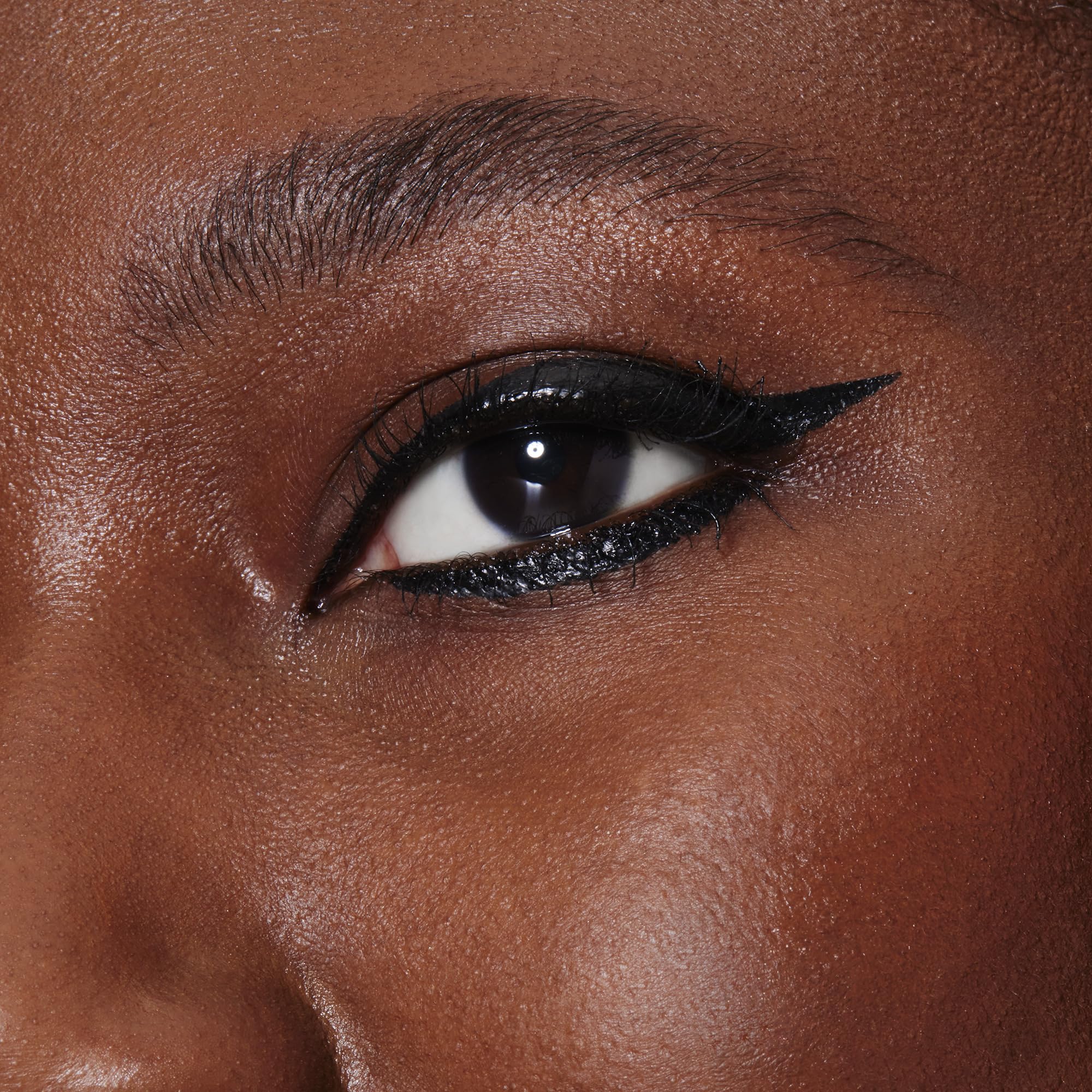 Matte finish graphic eye makeup look using e.l.f. Film Noir eyeliner