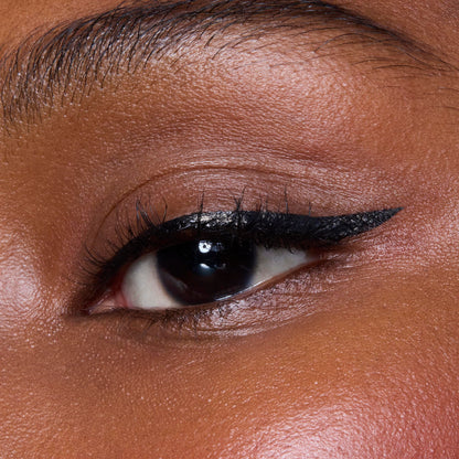 Model wearing cat eye look with e.l.f. H2O Proof Eyeliner