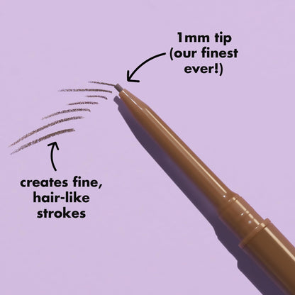 Sturdy spoolie brush end of the e.l.f. cosmetics brow pencil designed for grooming and blending.