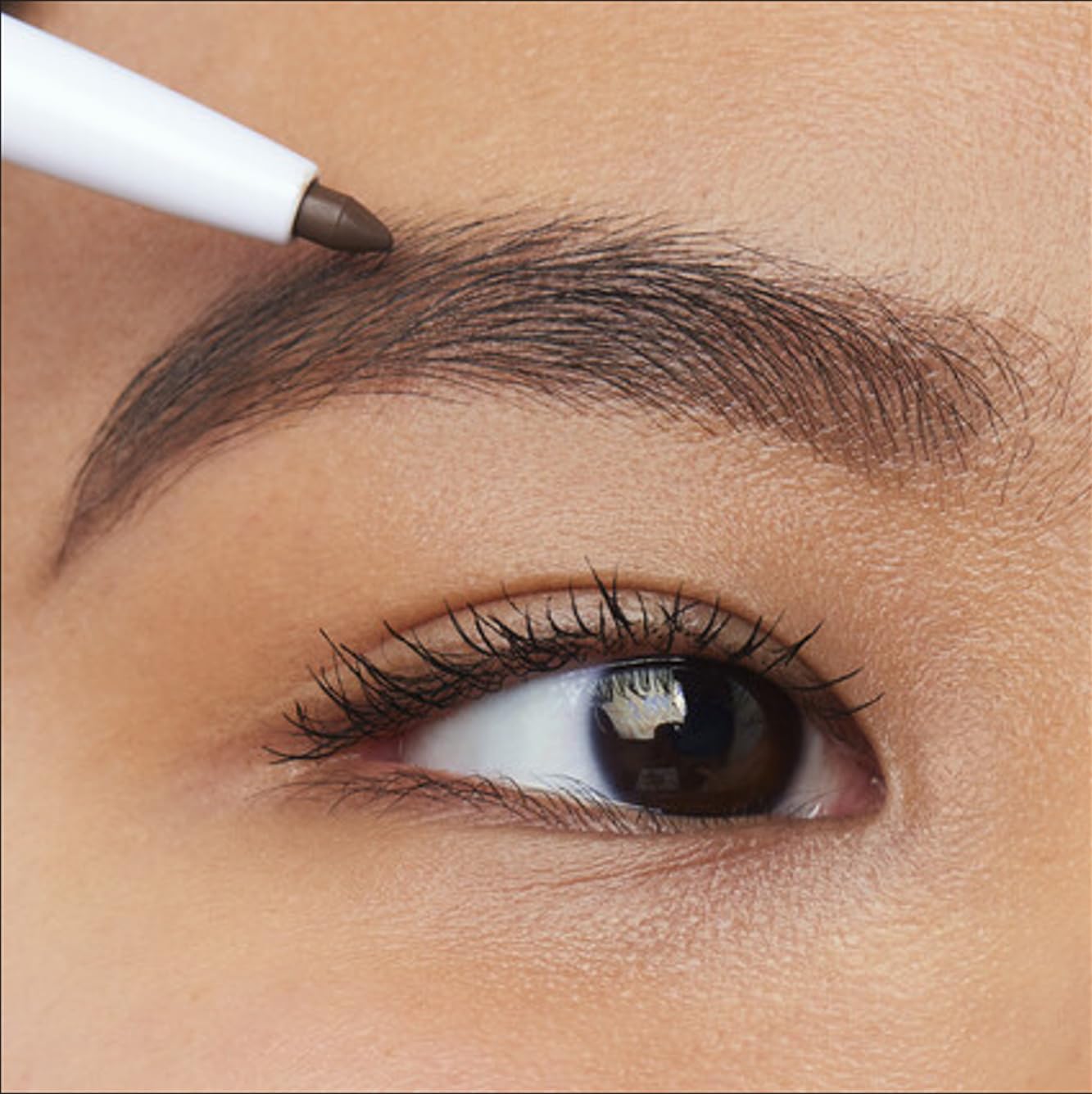 Top view of e.l.f. Instant Lift Brow Pencil cap and brush